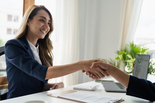 businessman handshake for teamwork of business merger and acquisition.