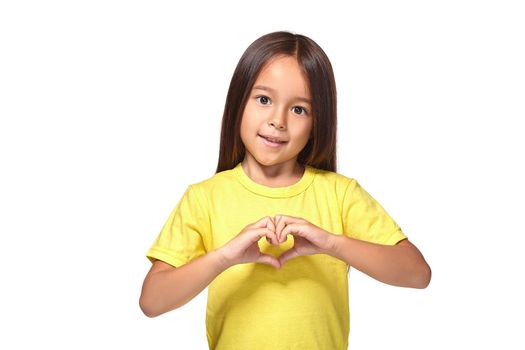 Little girl with her hands in heart-shaped isolated on the white background