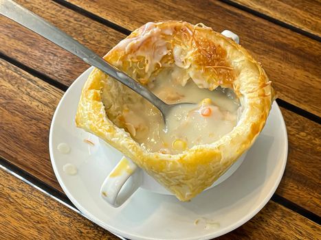 Chicken pot pie soup , zuppa toscana or bread or Tuscan or Minestra Pane or Zuppa soup. Made from kale, zucchini, beans, potatoes, celery, carrots, onion, tomato pulp, extra virgin olive oil, chili and chicken or bacon.