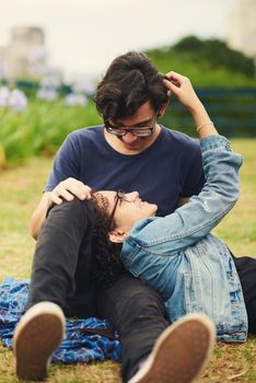 Our love is young but it will be everlasting. a teenage couple being affectionate outdoors