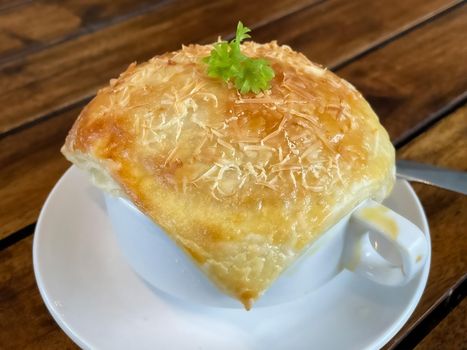 Chicken pot pie soup , zuppa toscana or bread or Tuscan or Minestra Pane or Zuppa soup. Made from kale, zucchini, beans, potatoes, celery, carrots, onion, tomato pulp, extra virgin olive oil, chili and chicken or bacon.