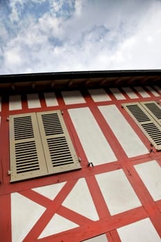 Facade of an old timbered house in Normandy, France