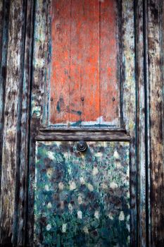 Old wooden and painted door before restoring