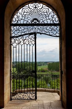 Wrought iron and balcony facing the countryside in South-West of France