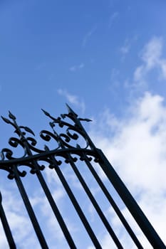 Wrought iron gate open in a park