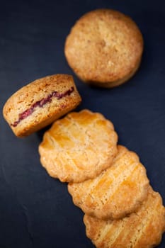 Crispy shortbread cookies filled with raspberry cream