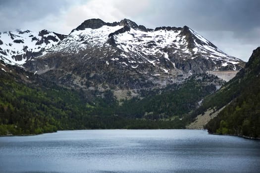 Landscape of Pyrenees mountains and lake in France