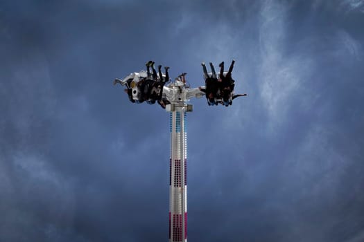 Close up of teens on a ride at a fairground