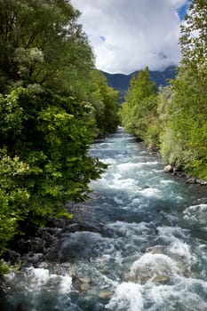 River and woods in Pyrenees mountains, France