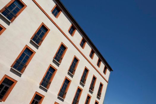 Windows on a facade of a stylish French facade