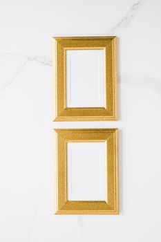 golden photo frame on marble, flatlay mockup - decor and mockup flatlay styled concept