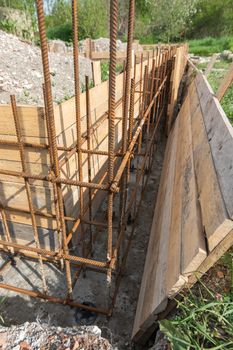 Installation of formwork during the construction of a strip foundation