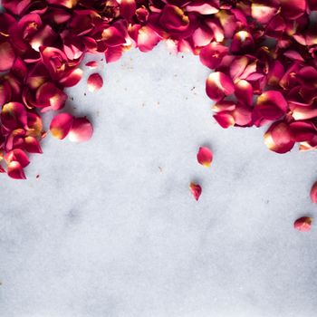 rose petals on marble flatlay - wedding, holiday and floral background styled concept, elegant visuals