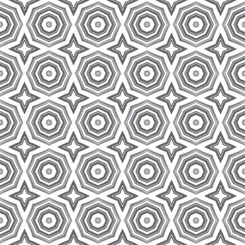 Ikat repeating swimwear design. Black symmetrical kaleidoscope background. Textile ready authentic print, swimwear fabric, wallpaper, wrapping. Summer ikat sweamwear pattern.