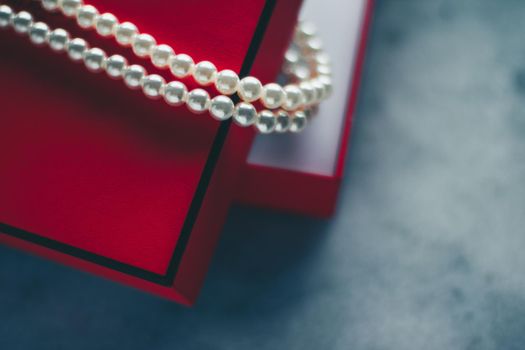 wonderful pearls in a red gift box, luxe present - jewellery and luxury gift for her styled concept, elegant visuals