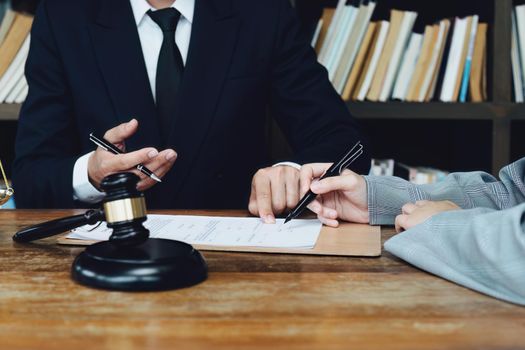 Discussing legal matters and signing important documents.