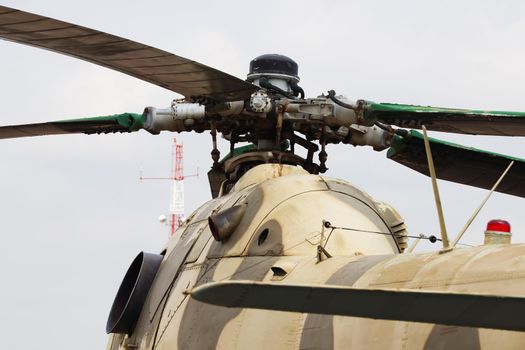 Military mi-24a attack helicopter gunship engine and rotor close-up abstract detail