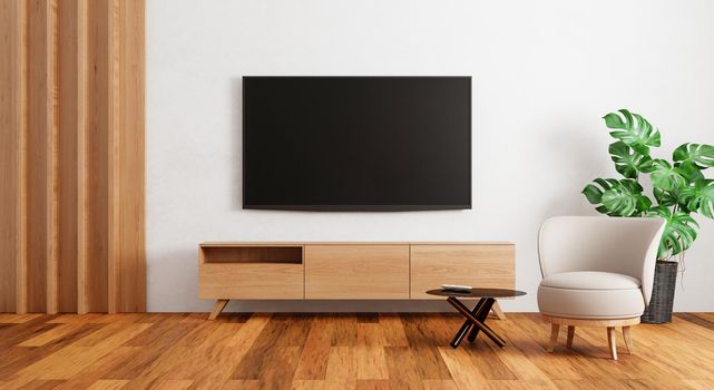 TV above wooden cabinet in modern empty room with plants carpet on wooden background. Japanese style theme. Architecture and interior concept. 3D illustration rendering