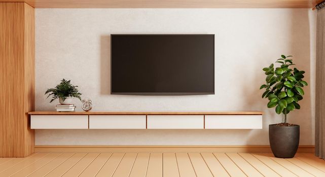 TV above wooden cabinet in modern empty room with plants carpet on wooden background. Japanese style theme. Architecture and interior concept. 3D illustration rendering