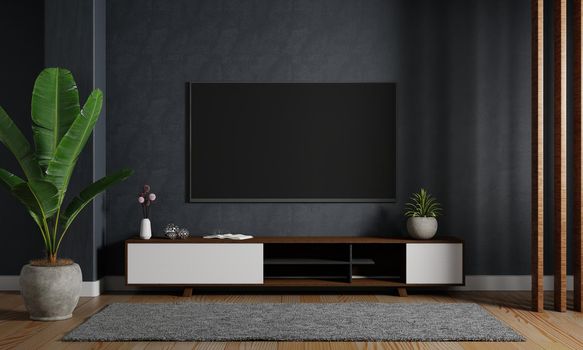 Modern mockup television tv hanging on the dark blue wall background with wooden cabinet in living room. Interior architecture and entertainment concept. 3D illustration rendering