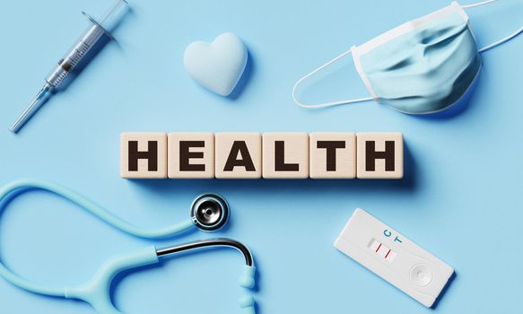 Health wooden word block cubes with medical equipment on blue paper background. Healthcare and healthy concept. 3D illustration rendering