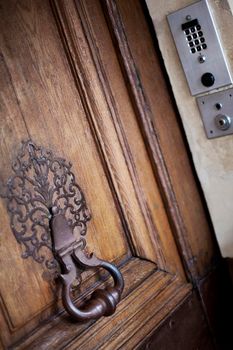 Close up of a weathered wooden door in Le Marais Paris