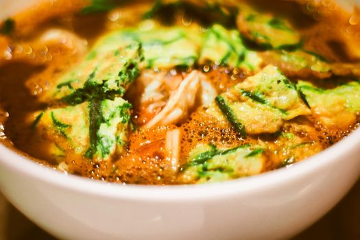 Fried Climbing Wattle Dipped in Egg with shrimp paste sauce or with sour soup.
