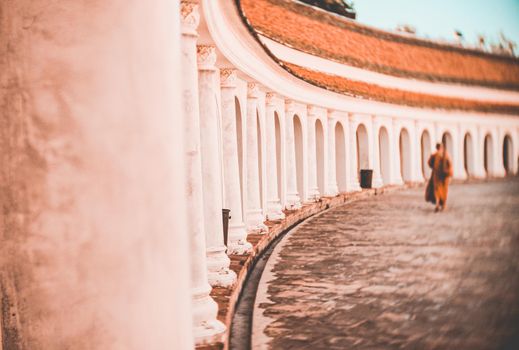 Arch walkway of Phra Pathom Chedi landmark architecture in Thailand.