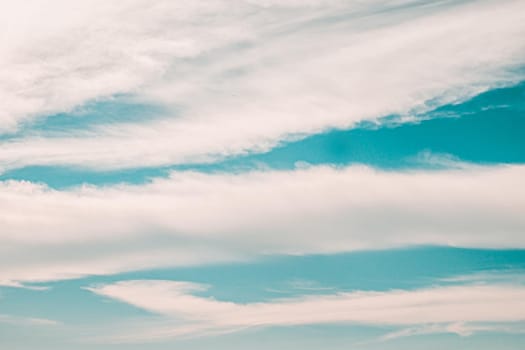 Beautiful white fluffy clouds sky background abstract season and weather.