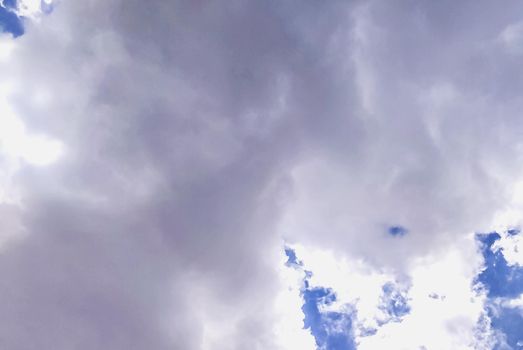 Huge white fluffys clouds sky background with blue sky background