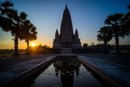 Wat-Panyanantaram or Mahabodhi Temple Bodh Gaya Pagoda in Thailand at sunset culture religion architecture
