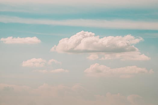 Beautiful white fluffy clouds sky background abstract season and weather.