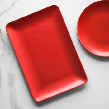 empty red plate on marble - recipe and restaurant mockup flatlay styled concept