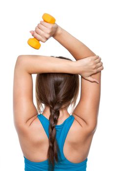 Young sporty girl does exercise standing dumbbells in yellow color on a white background. Back view.