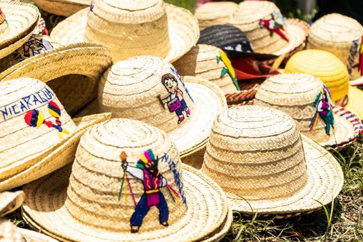 Traditional Nicaraguan hats for sale on the floor