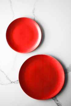 empty red plate on marble - recipe and restaurant mockup flatlay styled concept