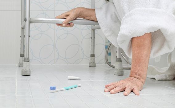 Elderly woman falling in bathroom because slippery surfaces