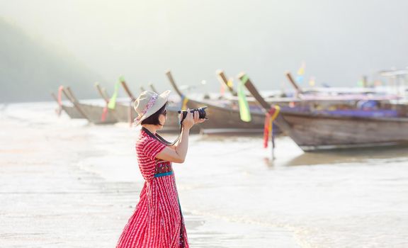 Tourist woman enjoying travel vacation in Krabi, Thailand.