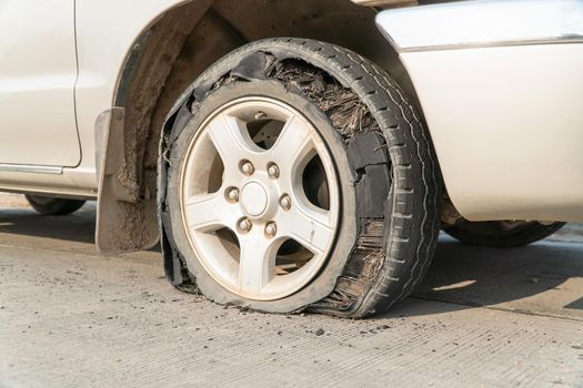 burst tire on the road