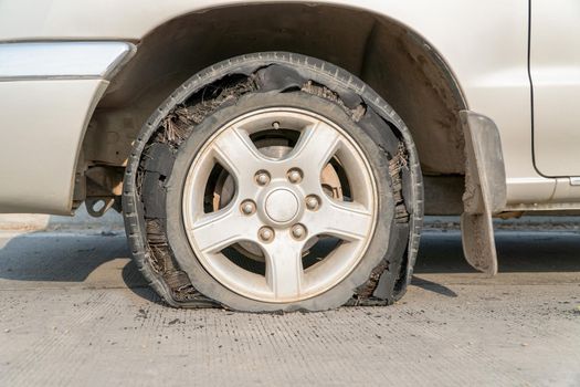 burst tire on the road