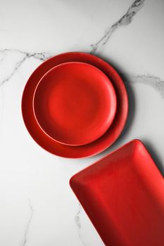 empty red plate on marble - recipe and restaurant mockup flatlay styled concept