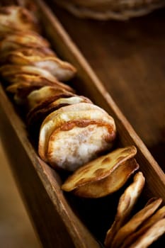 Small crispy cakes in a wooden box