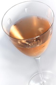 Close up of rose wine on a crystal glass