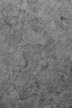 Gray concrete wall, abstract texture background. Close-up photo of an abandoned concrete wall.