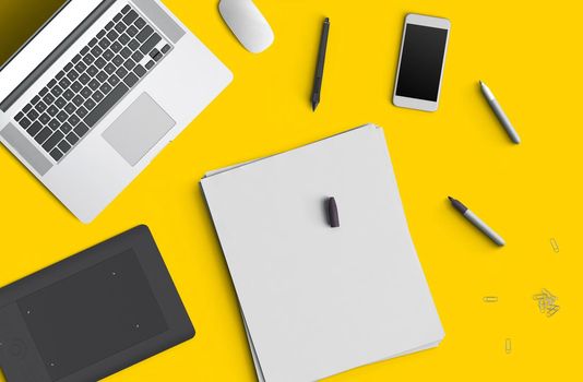 Minimal work space concept: smart phone, pen, pencils, notepad, notebook, tablet, laptop, composition on yellow background. Flat lay top view Copy space Still life