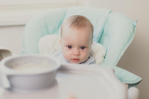 The first lure of the baby. Baby food. An article about the nutrition of children. The baby's first porridge.
