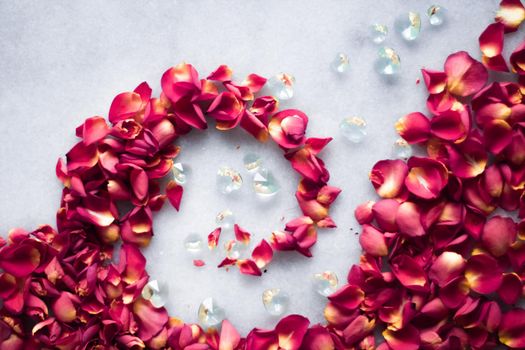 rose petals on marble flatlay - wedding, holiday and floral background styled concept, elegant visuals