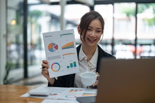 business woman presentation about statistics graphic of selling and production by video conference