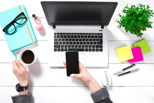 Overhead view of businesswoman working at computer in office. Place for your text. Ideal for blog. Flat lay