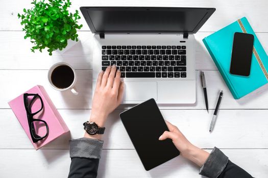 Overhead view of businesswoman working at computer in office. Place for your text. Ideal for blog. Flat lay